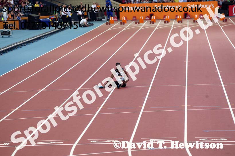 Mens 100 metres Yohan Blake sitting on the track after injuring himself at the Glasgow Diamond League. Photo: David T. Hewitson/Sports for All Pics